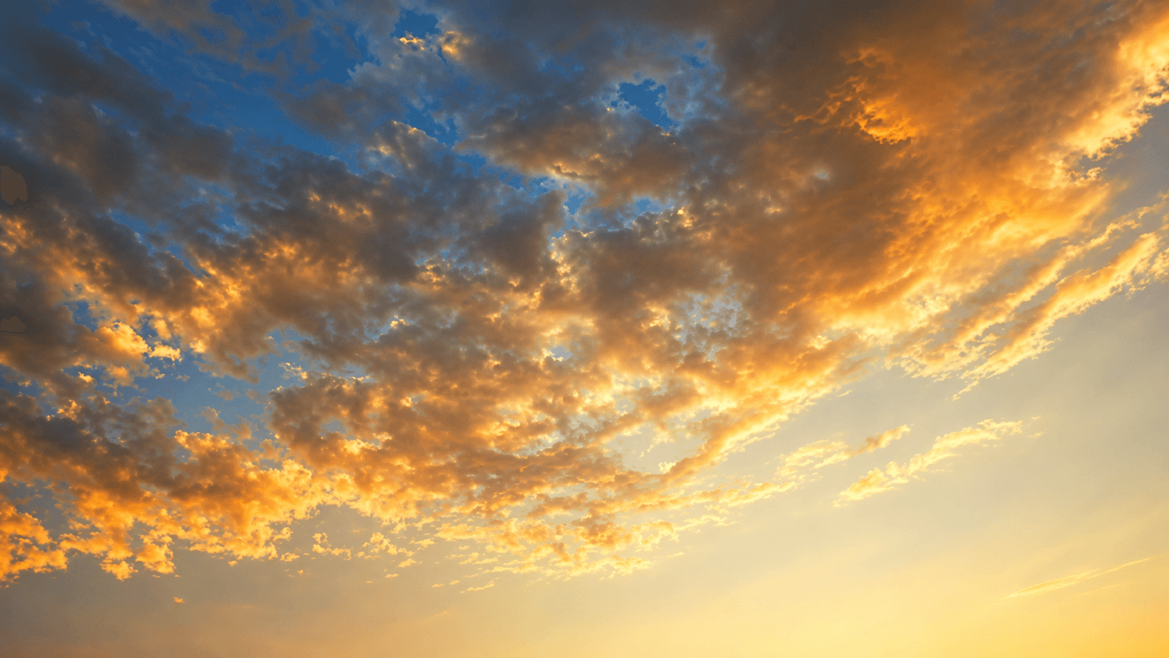 Sunlit clouds at golden hour